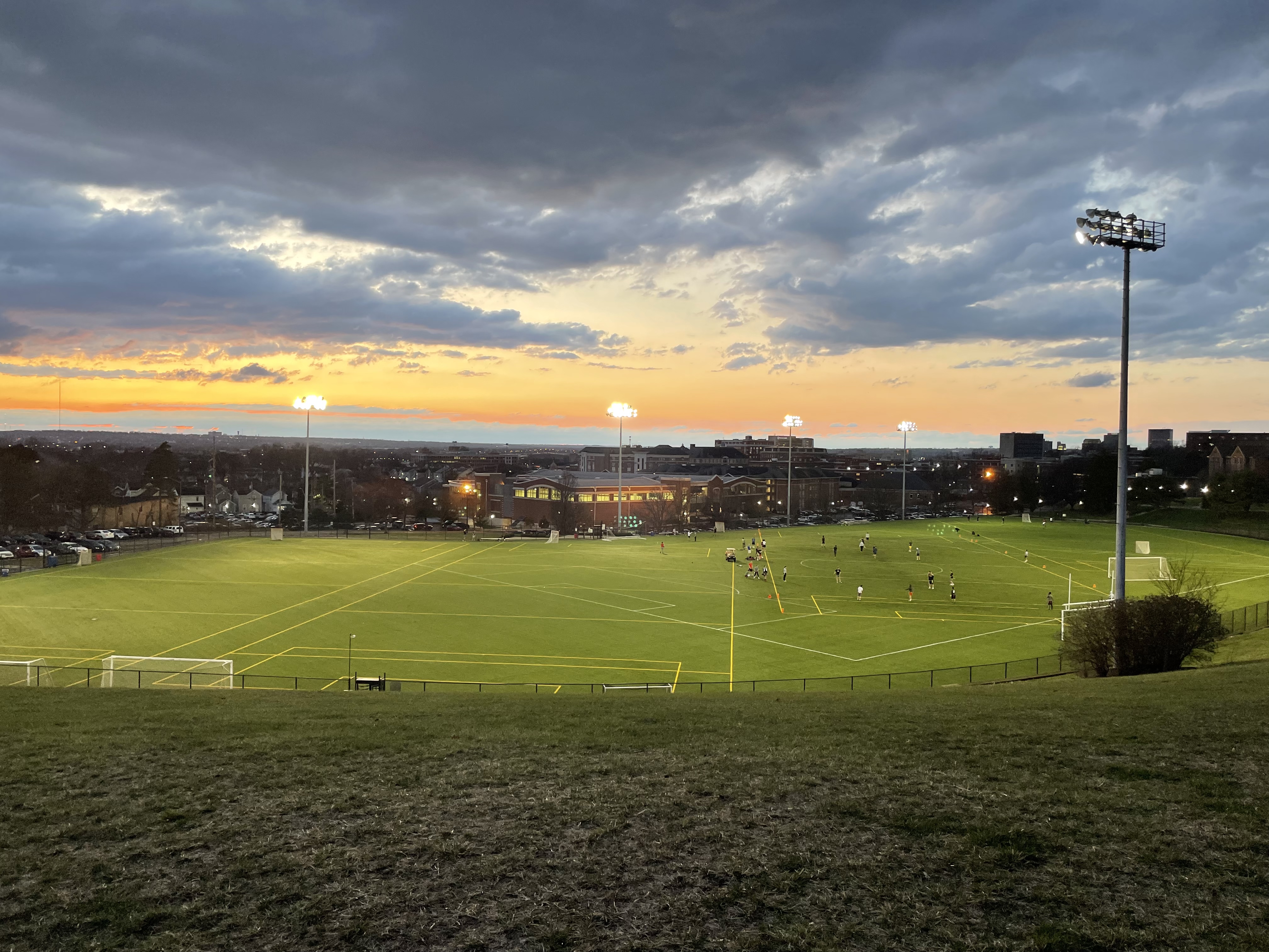A view of Stuart Field from Stuart Hill at sunset