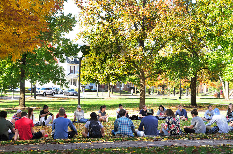 ${ Class outside on UD's campus }