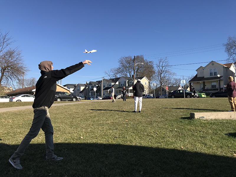 Students outside testing airplanes