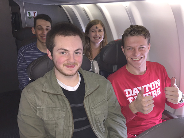 Students Nick Dalton, John Michael Gomez, Maggie Boyd and Ryan Harpst (L-R) aboard the plane to Washington, D.C.
