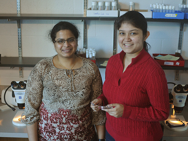 Former graduate student Indrayani Waghmare (left) and current graduate student Neha Gogia (right)