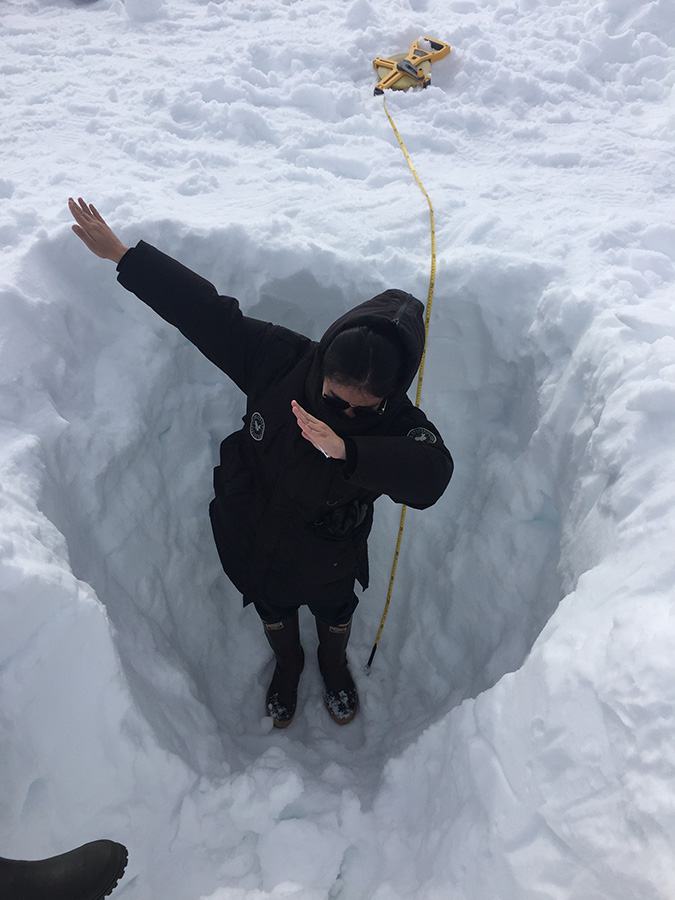 Ming dabbing in a snow hole
