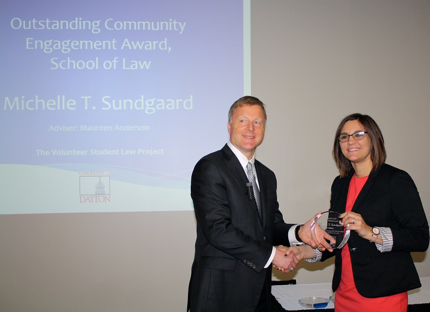 Michelle T. Sundgaard '16 receiving the 2016 Graduate Showcase Award for Law Student Community Engagement