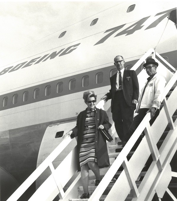 Erma Bombeck exiting airplane
