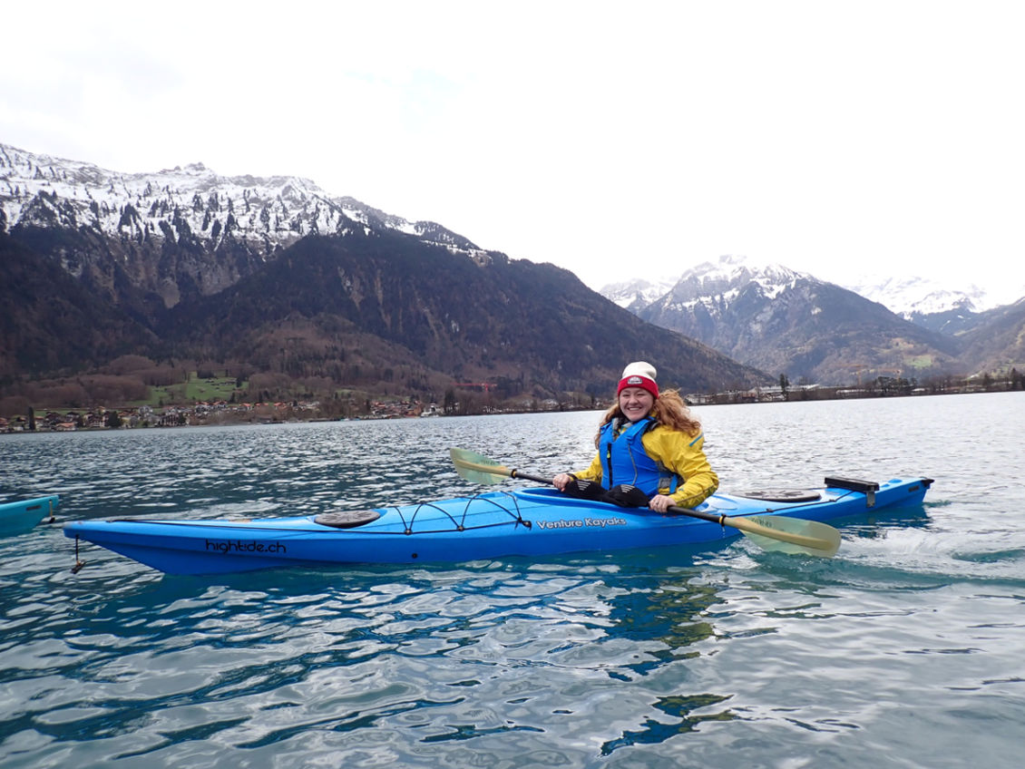 Tara McLoughlin in a kayak on Lake Interlaken in Switzerland with the Bernese Alps filling her background. One of the most incredible trips she was fortunate to take. 