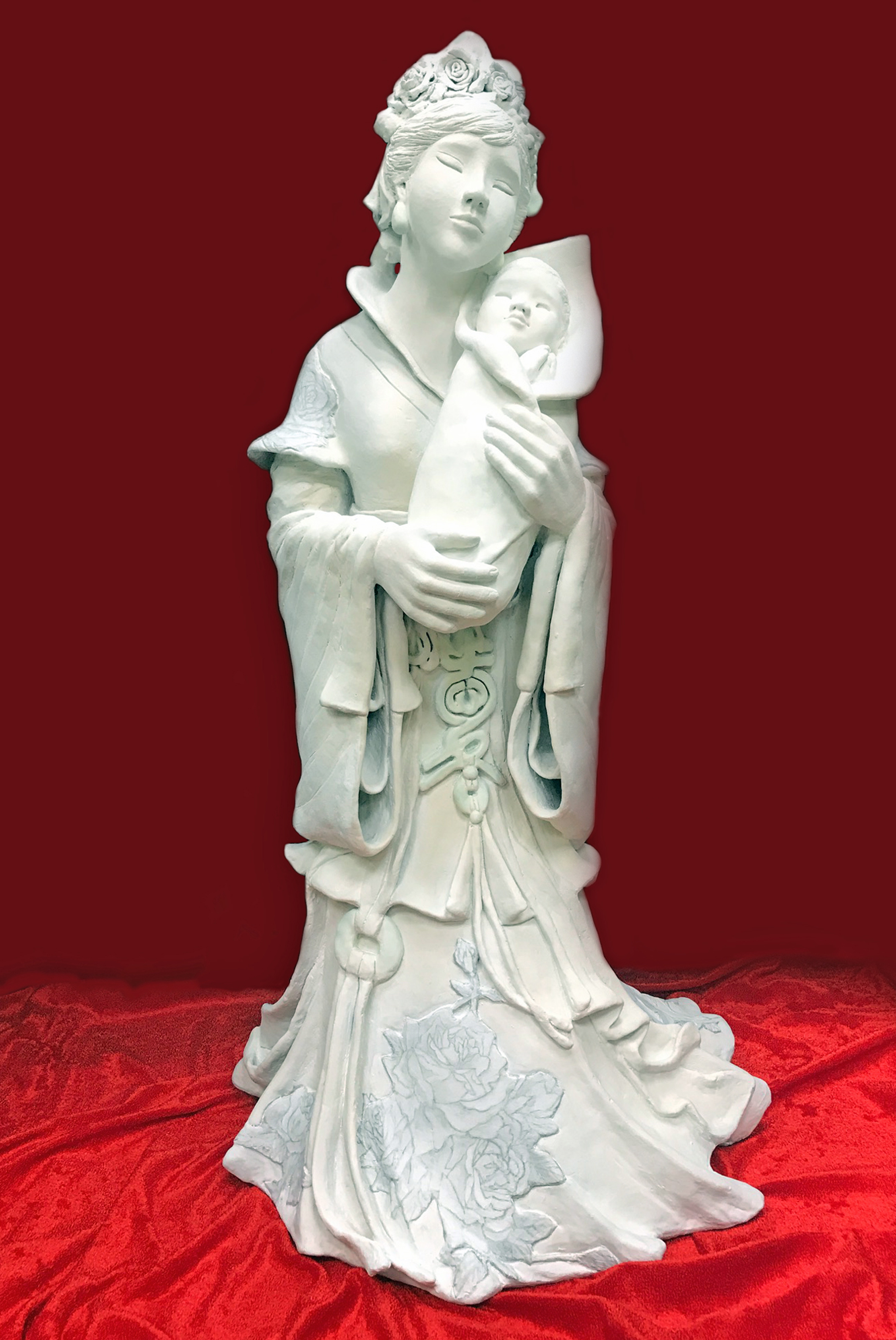 "Love and Grace" is a ceramic sculpture by Dr. Yufeng Wang.