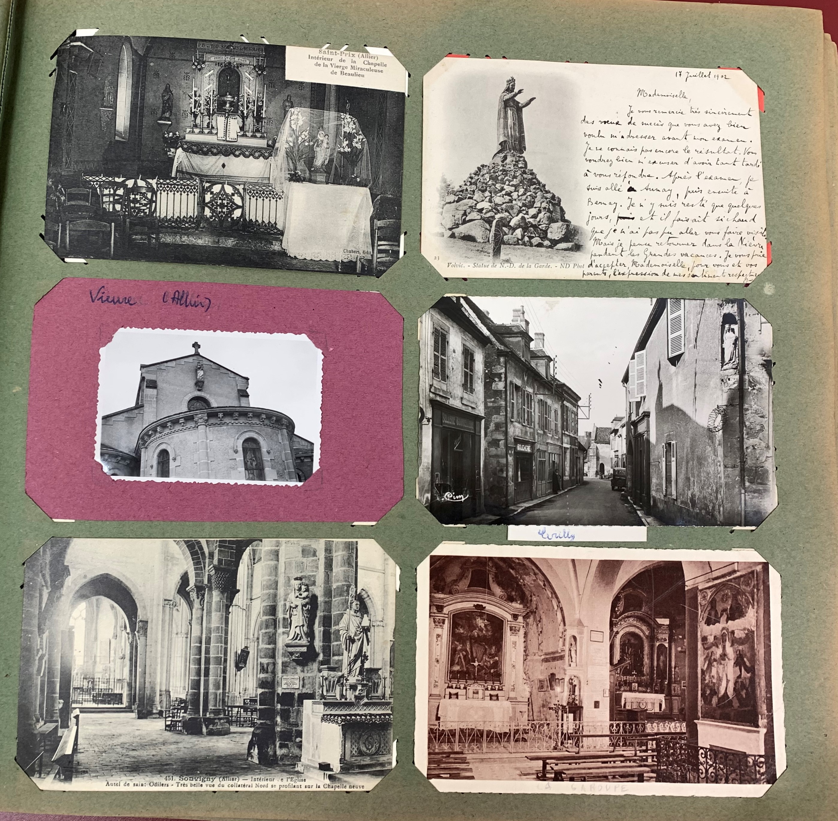 Page from an album with photographs and travel postcards