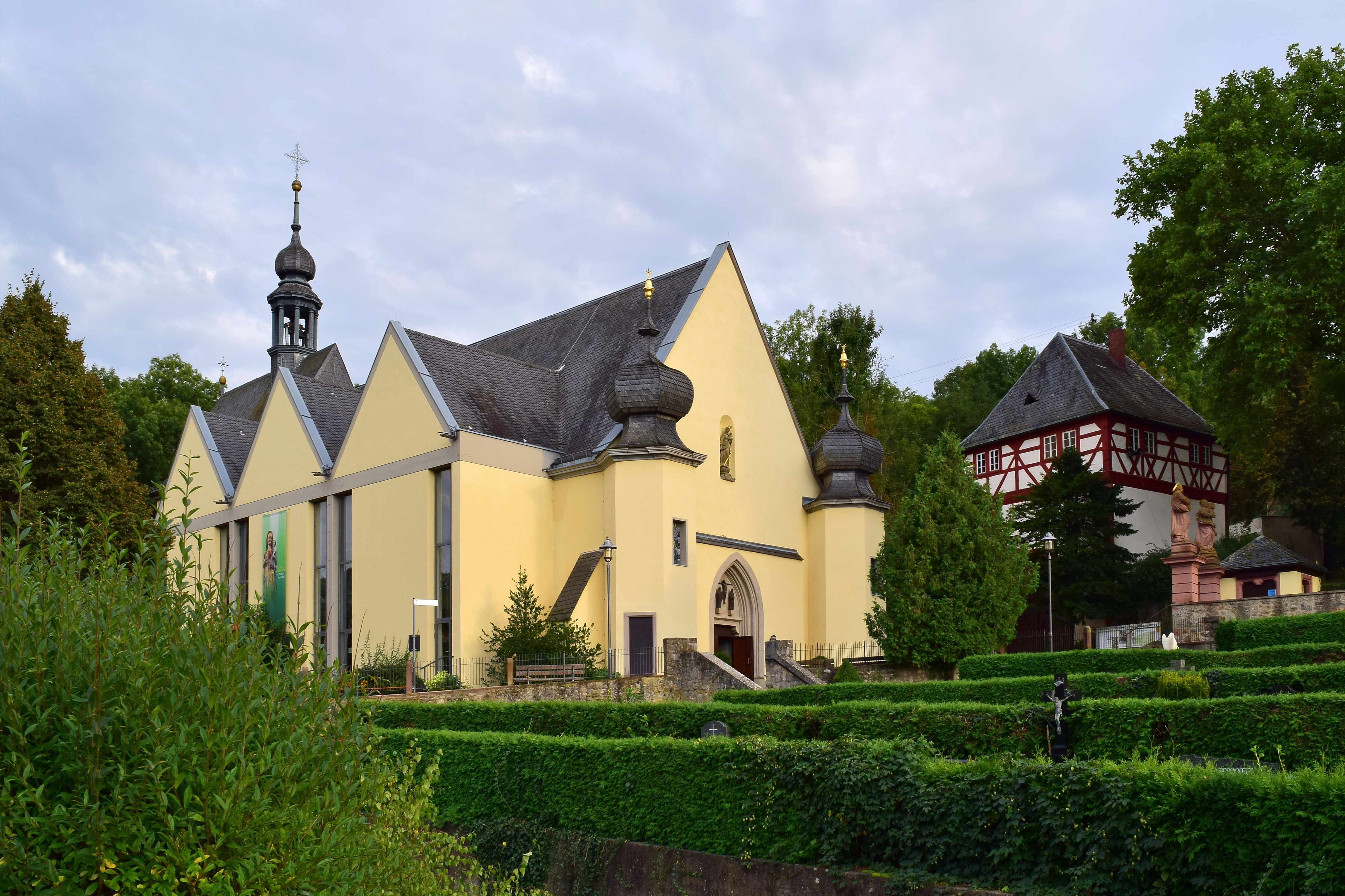 Photo of the church's exterior in the scenic landscape