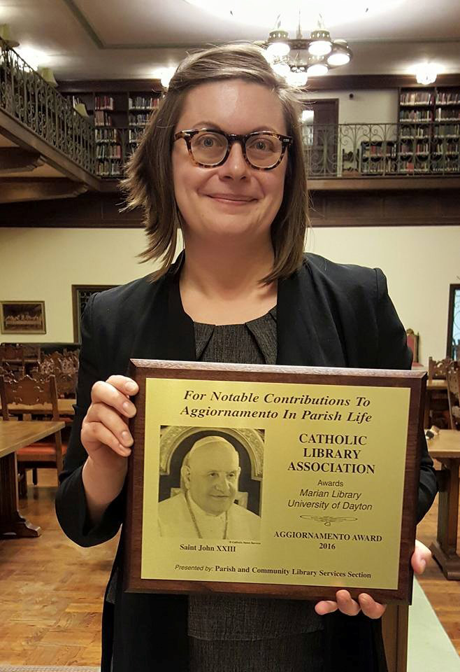 Director of the Marian Library, Sarah Burke Cahalan with the Aggiornamento Award