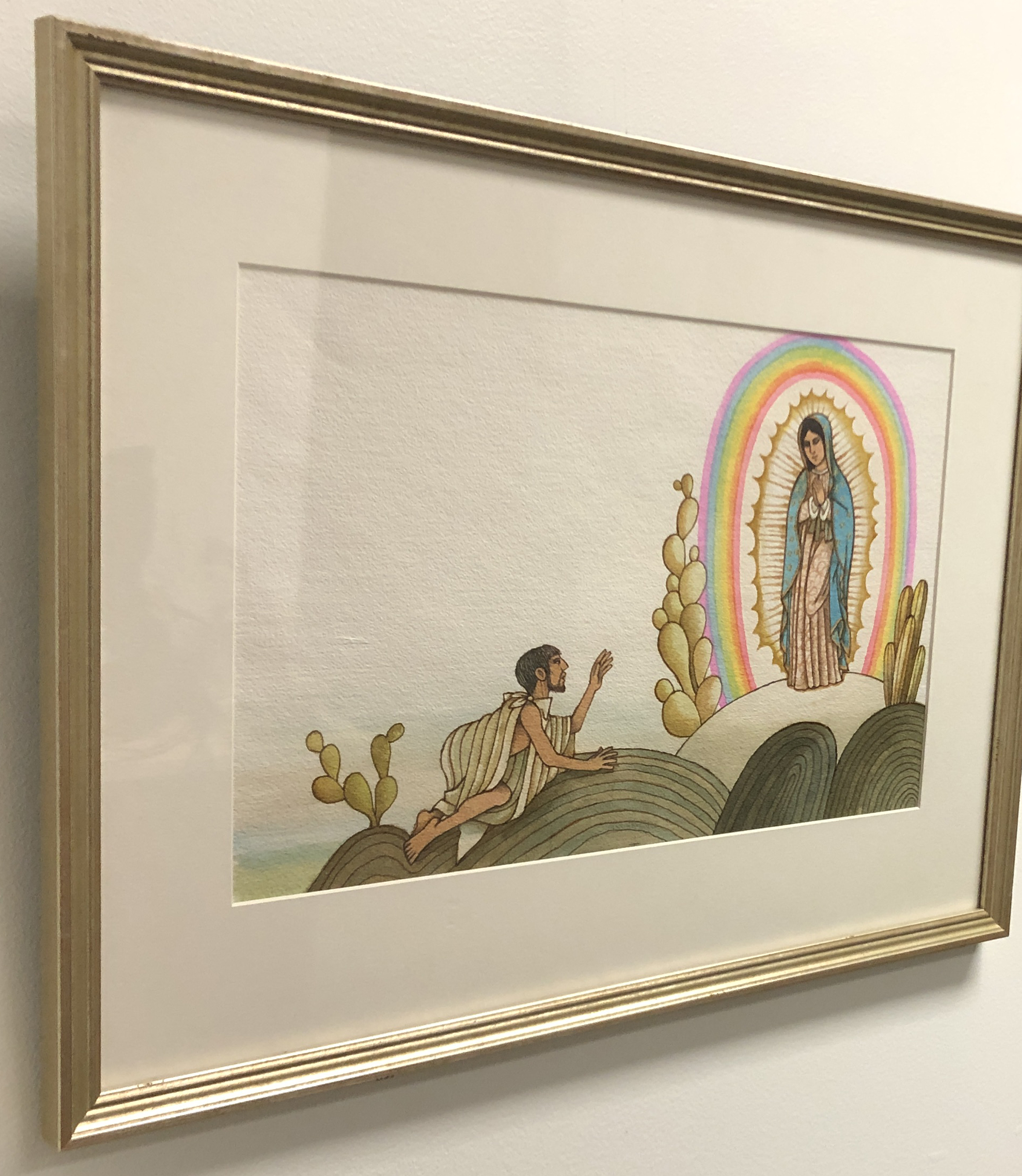 Frame water color of Our Lady of Guadalupe on a hill and Juan Diego on hands and knees