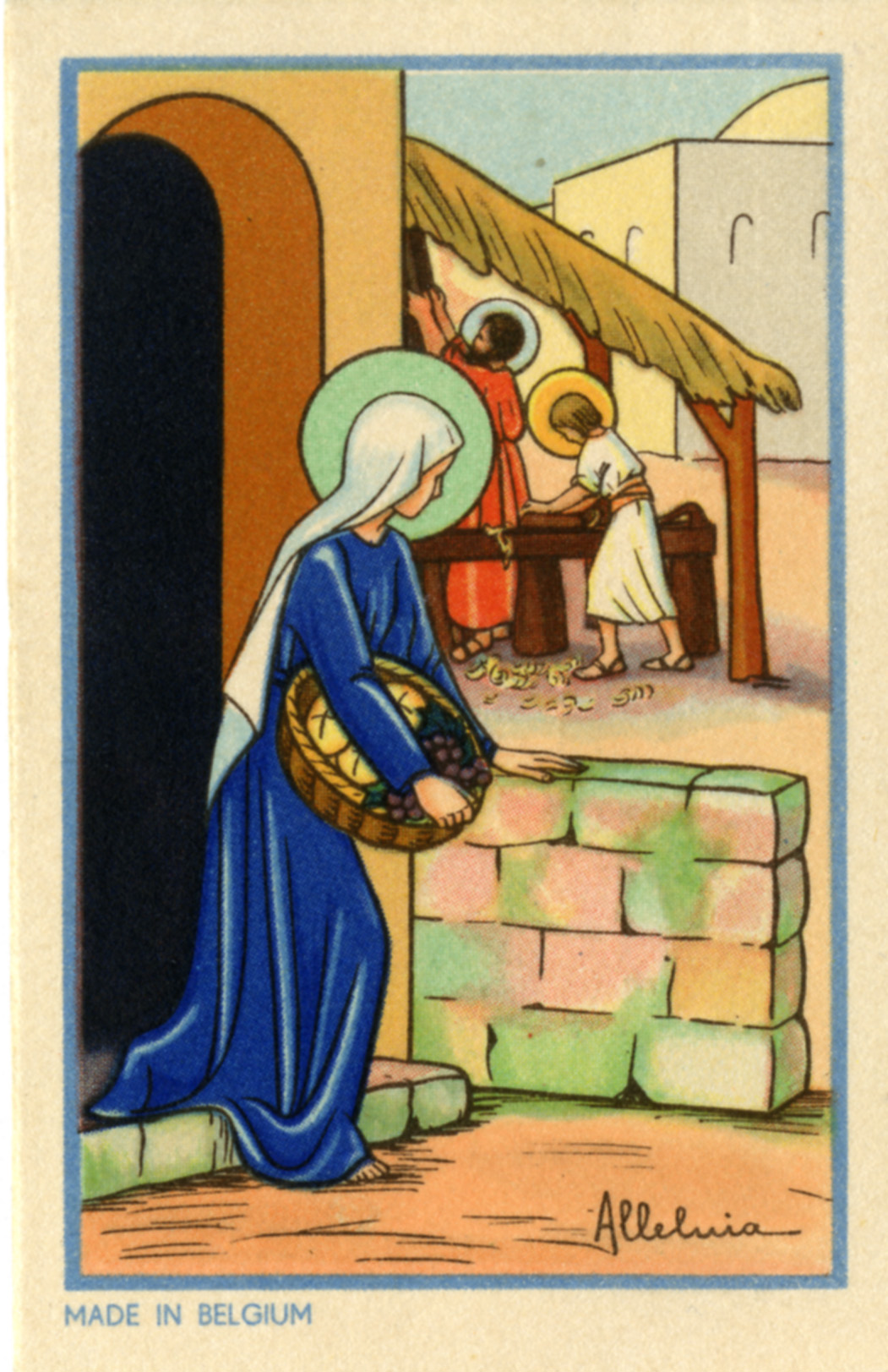 Full color holy card of a scene of the Holy Family where Mary is looking on while Joseph works with Jesus in the distance.