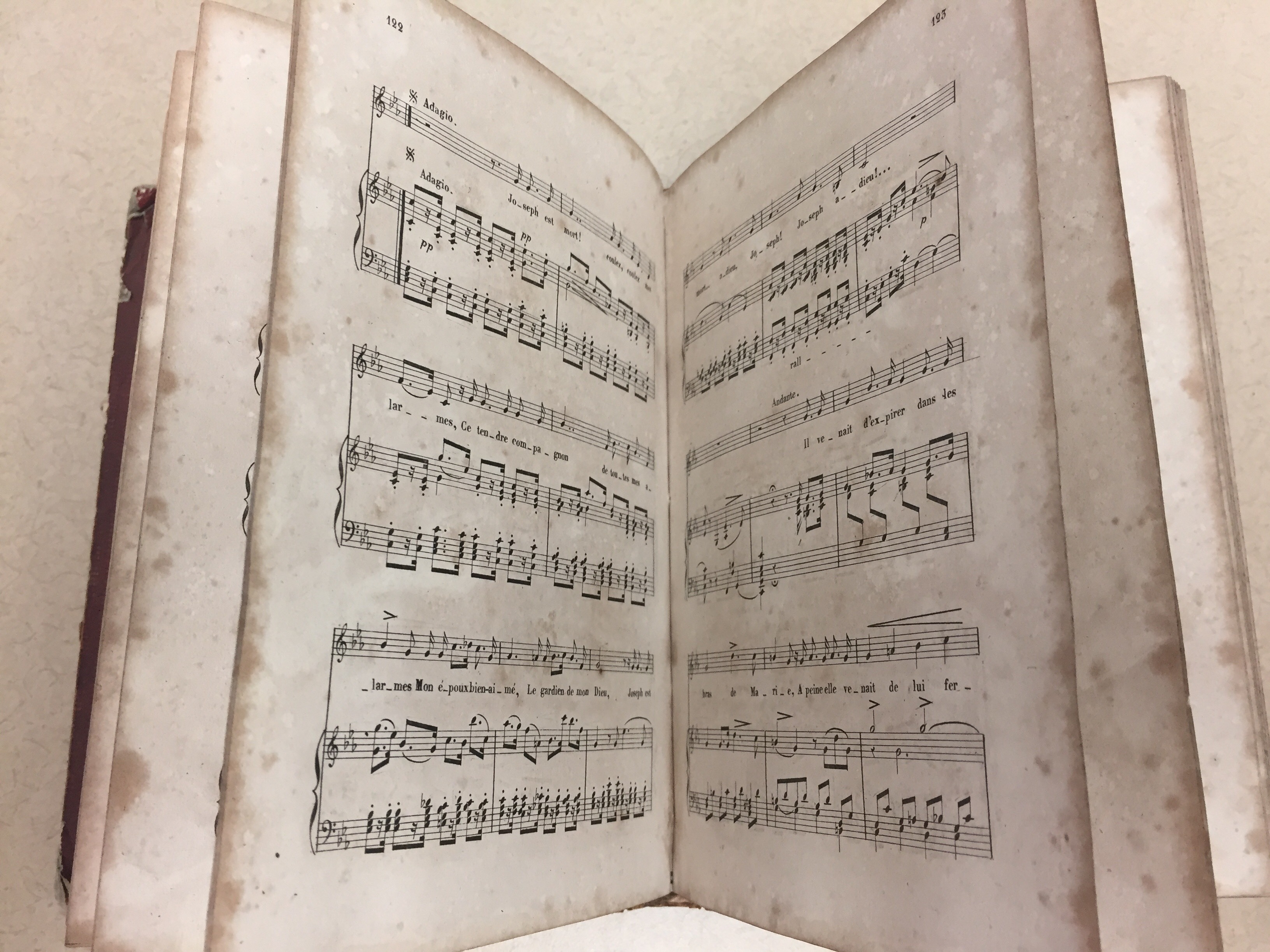 Hymnal open with pages fanning out