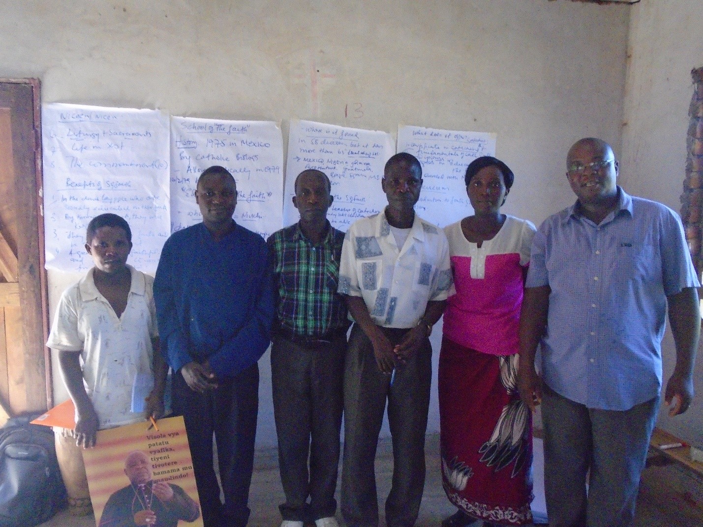 Wallace (far right) with his class of primary school teachers after teaching them about the Sacraments. 