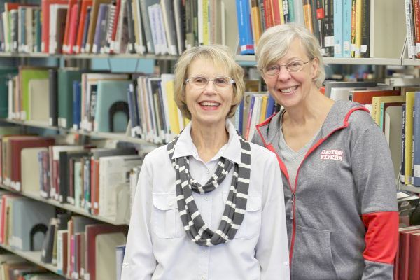 Since 2014, Jan Moyer, left, and Patty Meinking have added more than 2,000 e-book titles to the UD library catalog through a tool called demand-driven acquisition.