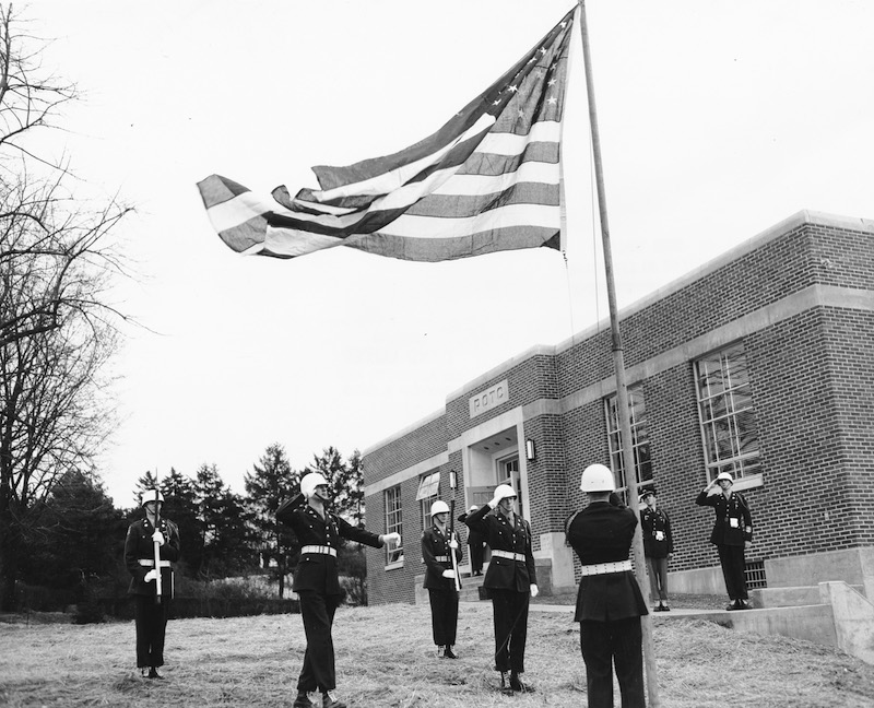 Photo of ROTC students raising the flag