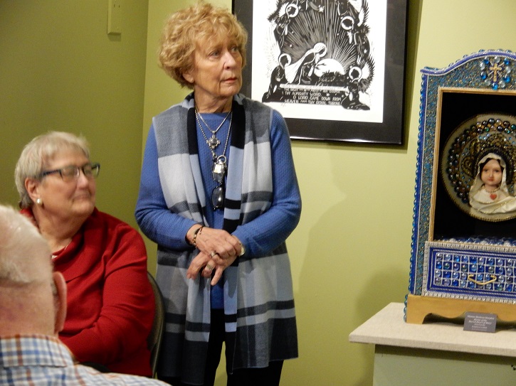 Libraries Advisory Council members explore Marian Library exhibit