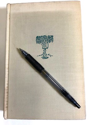 Picture of book cover with a pen for scale