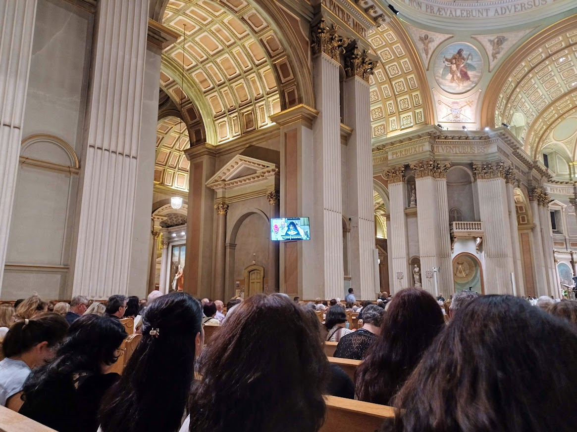 The cathedral had tv screens for the crowd to see the ceremony