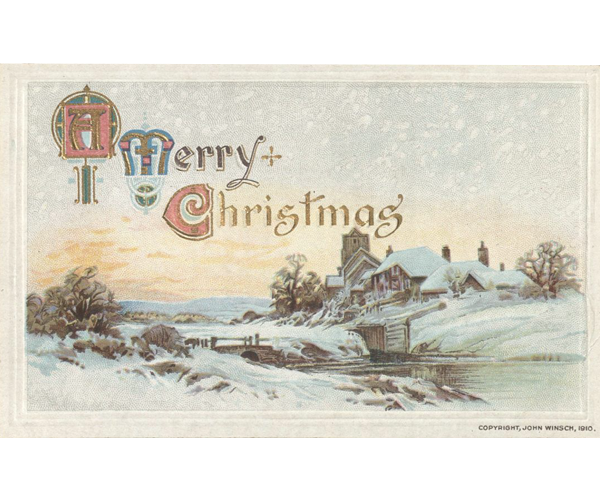 Embossed Christmas postcard with a colorful and stylized Christmas message reading: “A Merry Christmas” above a snow-covered village. The village is on the banks of a river with a stone and wood bridge over it leading to the village. Copyright information is printed at the bottom right corner: “John Winsch, 1910.”  