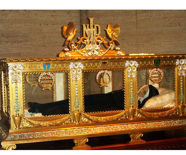 The body of Bernadette Soubirous  glass and gold coffin