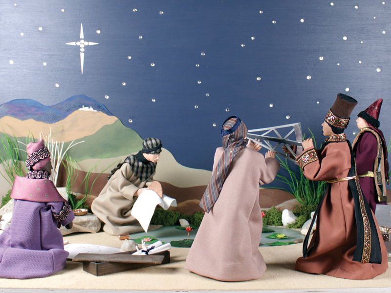 In most depictions, the wise men have already made it to the stable and are in the act of presenting their gifts. In this scene crafted by Harry and Cecilia Mushenheim, the journey of the astronomers is the story. Watch as they scientifically plan their course to reach the star that shines far off in the distance.