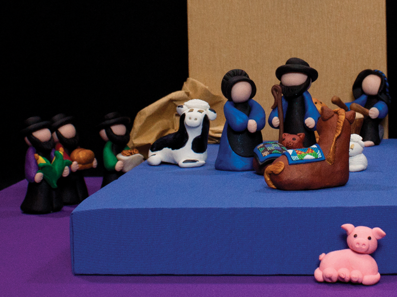 Plain and simple is the theme of this Nativity by Esther O’Hara of the United States. These wise men do not bring gold, frankincense and myrrh to the manger; instead, they bear gifts of nourishment for the Holy Family.