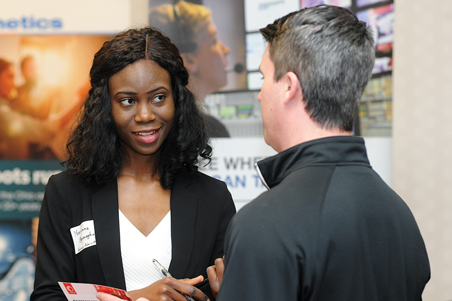 Student talking to potential employer at Career Fair