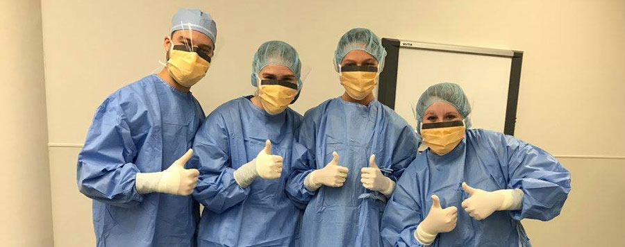 Physician Assistant students wear personal protective equipment