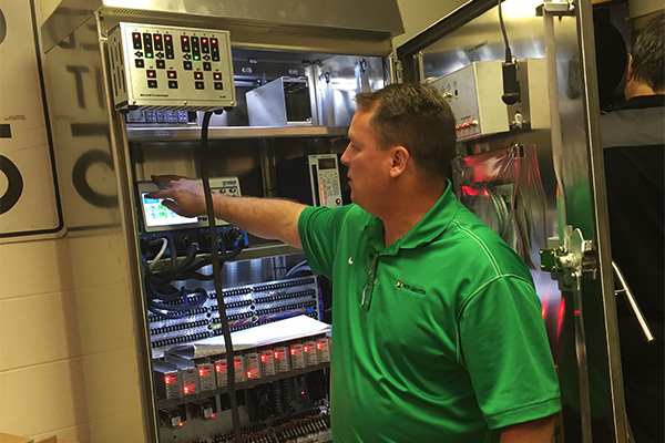 Scott Morse from Path Master demonstrates the features of the new control cabinet.
