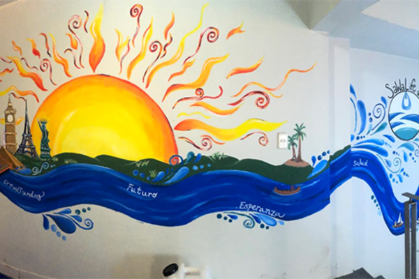 A mural for one of the ETHOS community building projects. 