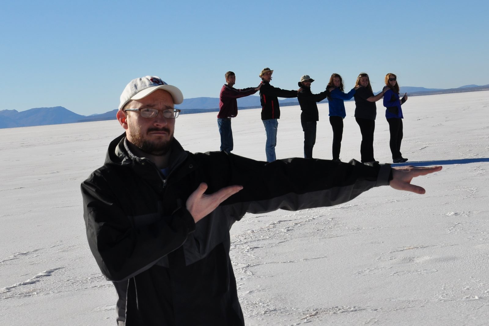 Dr. Strosnider with environmental engineering students from Saint Francis University taking a break from a service engineering trip in highland Bolivia to goof off on the largest salt flats in the world. 