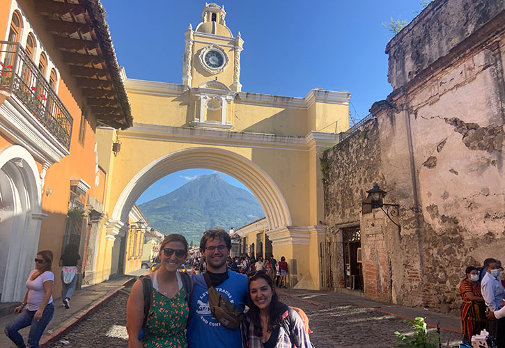 Laura Wilker, Caleb Albright and Elise Clement in front of the Santa Catalina Arch in Antigua, Guatemala