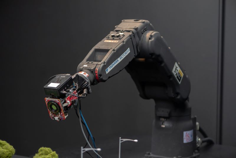 camera attached to a robotic arm