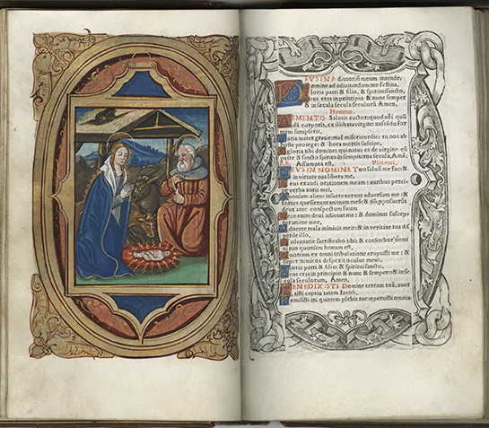 Open book of hours for use in Rome showing the Nativity