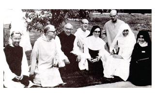 Thomas Merton (center) sits among other participants in the Bangkok conference of Benedictine and Trappist monks