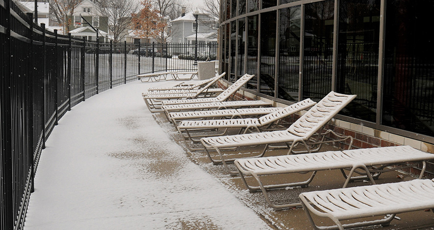 Snow on lounge chairs