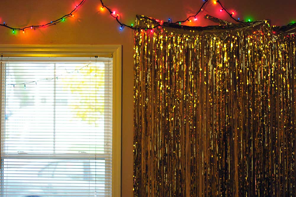 Borrowed permanently from the residents' sorority bid day decorations, the gold streamers add color to the house and are commonly used as a backdrop when taking pictures. 