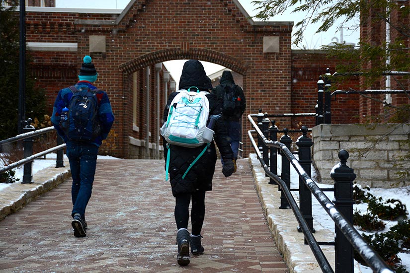 Students make their way to classes in the cold