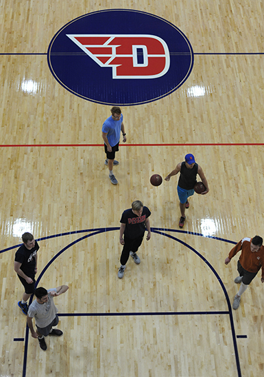 Students play basketball in RecPlex