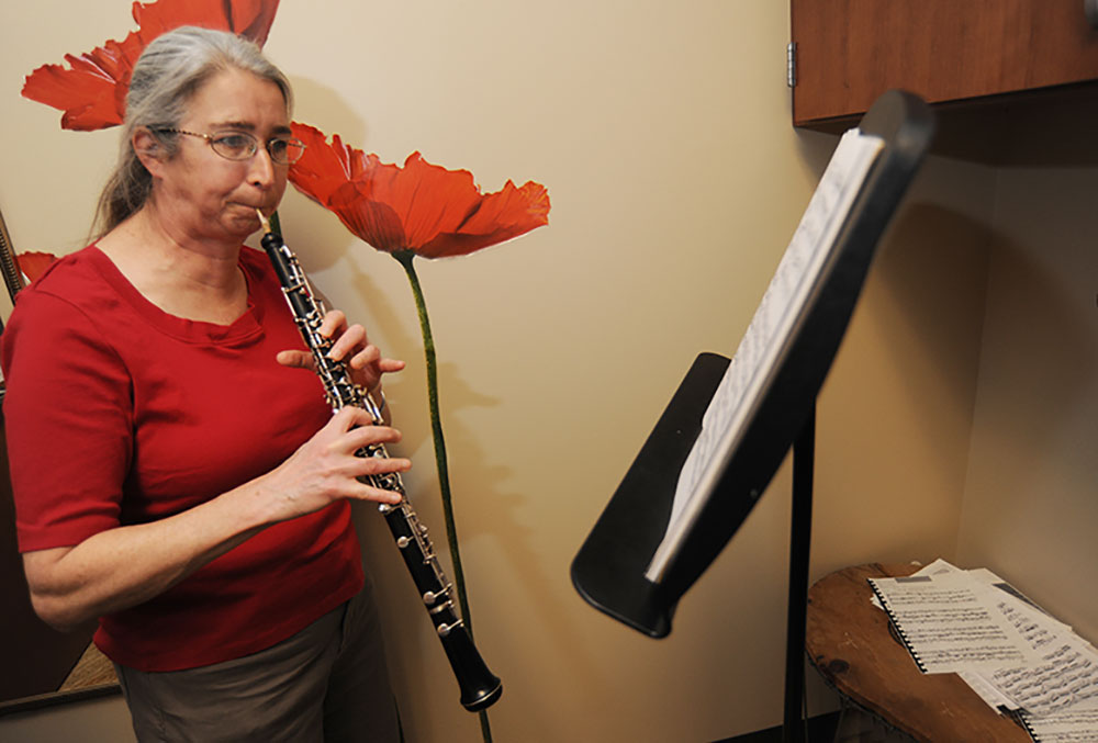 Faculty plays oboe.