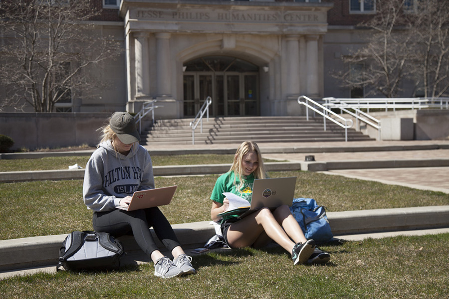 Students study in Humanities Plaza.