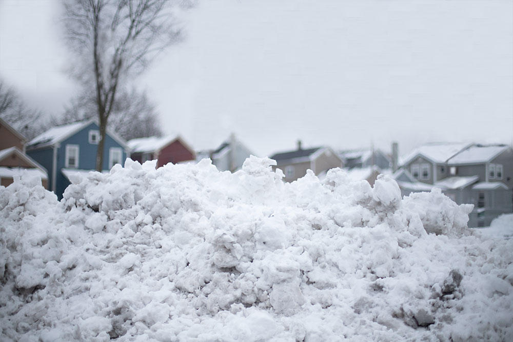 snow heap near student houses