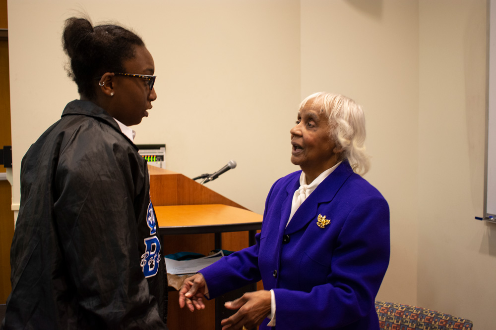 Betty Daniels Rosemond talks with a student.