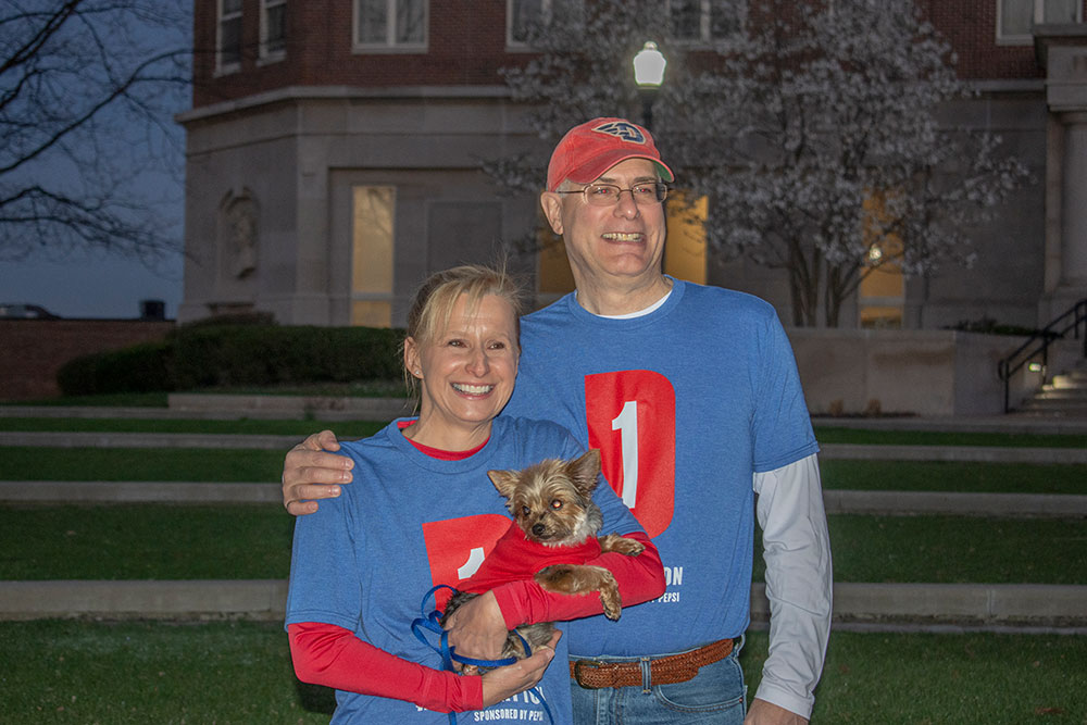 President Spina and his wife, Karen pose with their Dog