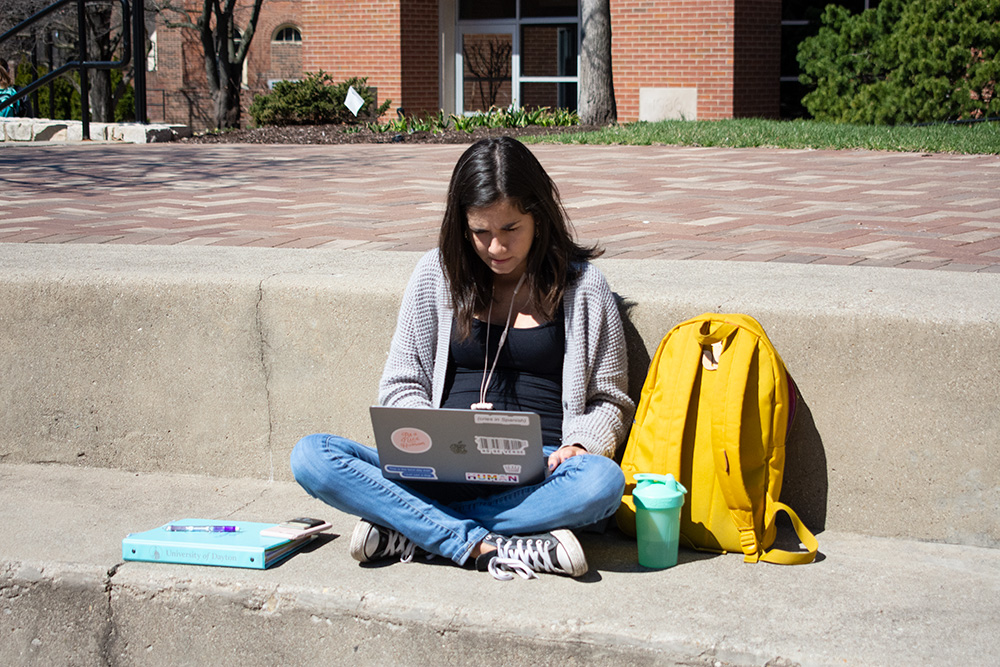 a student studies outside
