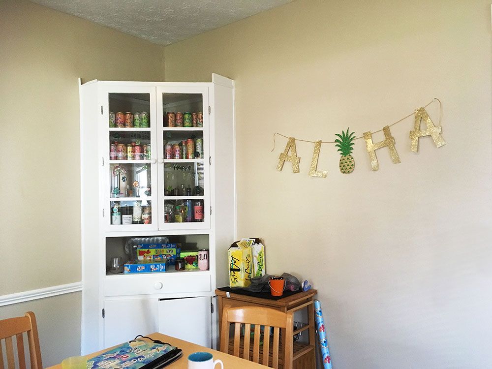 students decorate home with sparking water cans
