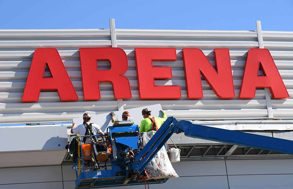 UD Arena signage being installed