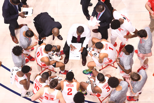 team in a time-out huddle