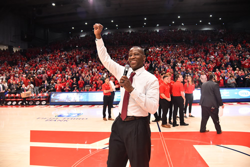 Coach Anthony Grant waves to the crowd in UD Arena