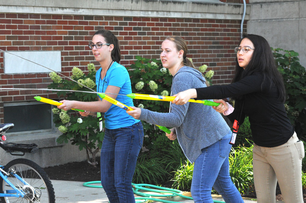 Students experiment with water guns